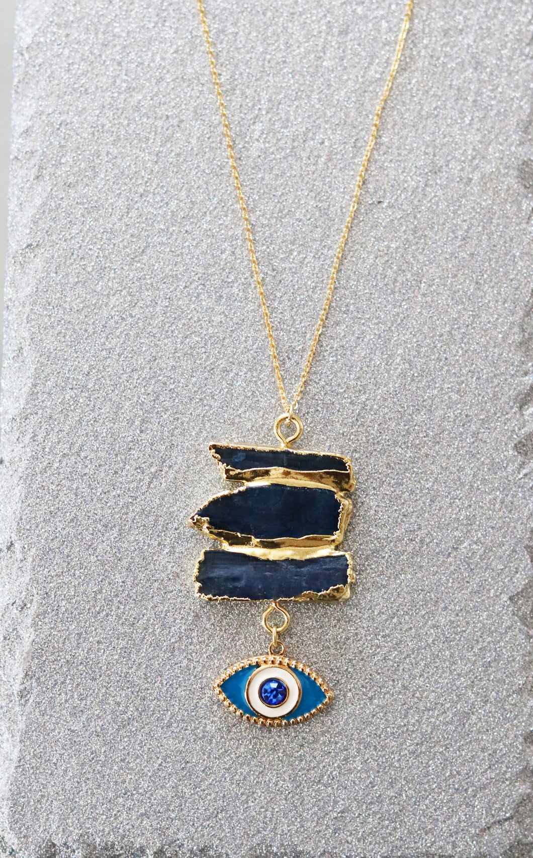 blue kyanite evil eye necklace